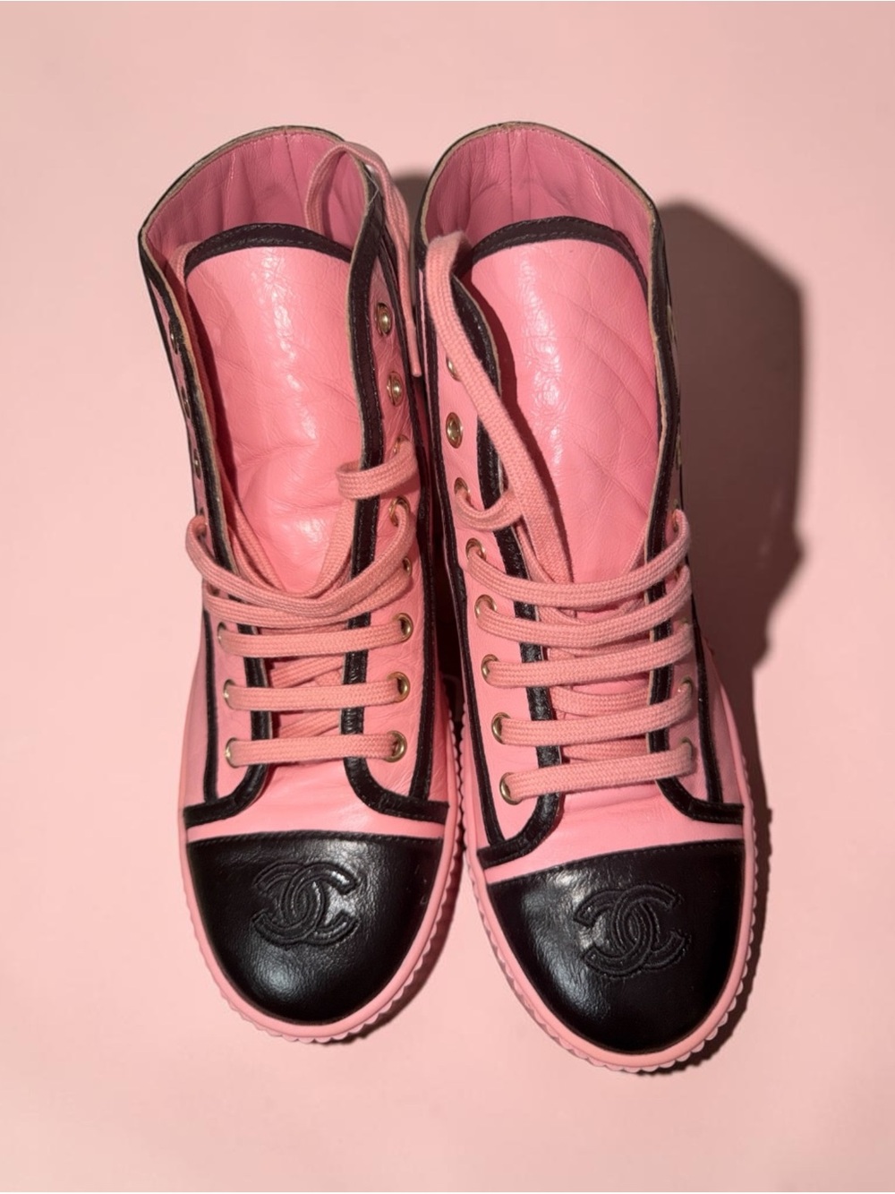 CHANEL Pink and Black High-Top Sneakers